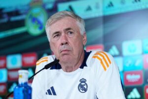 Carlo Ancelotti gestures in frustration during Real Madrid's 1-1 draw against Mallorca, as defensive lapses marred their LaLiga season opener.