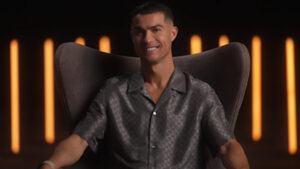 Cristiano Ronaldo celebrates breaking the YouTube record for reaching 10 million subscribers in under 12 hours, showcasing his unmatched global influence and digital prowess.