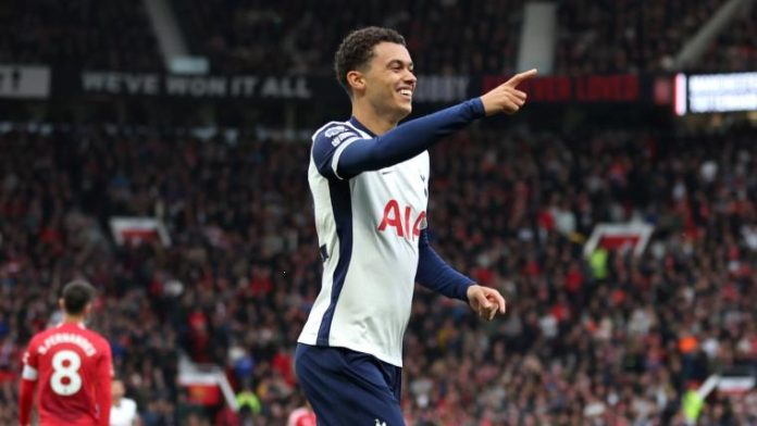 Tottenham’s Brennan Johnson celebrating after scoring the opening goal against Manchester United in a 3-0 win at Old Trafford.