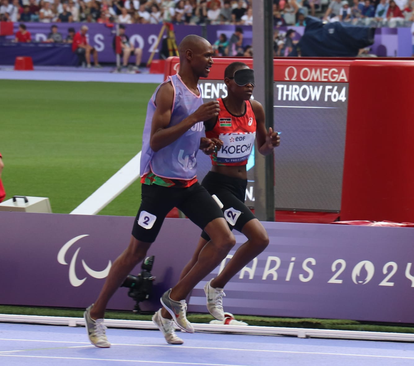 Kenya's Nancy Chelangat with her guide Geoffrey Rotich at Paris Paralympics 1500m T11 final