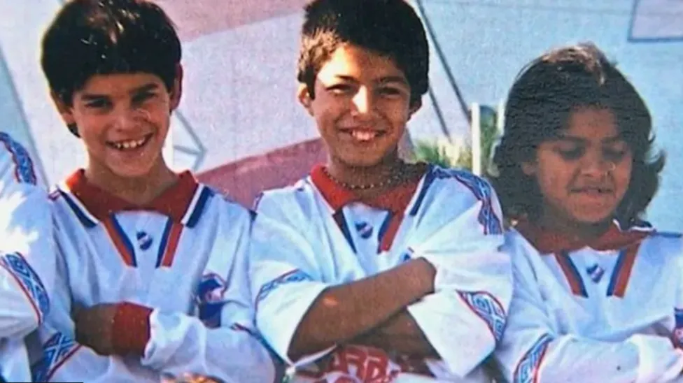 Suarez (centre) played youth football for Nacional in Montevideo