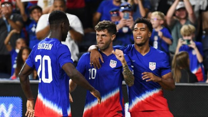 The USMNT celebrates Christian Pulisic’s 69th-minute goal during Mauricio Pochettino’s debut match, showcasing moments of brilliance amidst a challenging 1-1 draw with New Zealand.