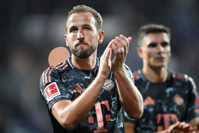 Kane celebrating his hat trick in Bayern Munich’s 7-0 win over Holstein Kiel, breaking the Bundesliga record for fastest 50 goal contributions.