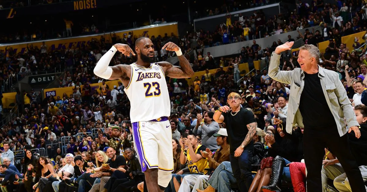 LeBron James records triple-double, Davis scores 31 in Lakers' 131-127 win over Kings