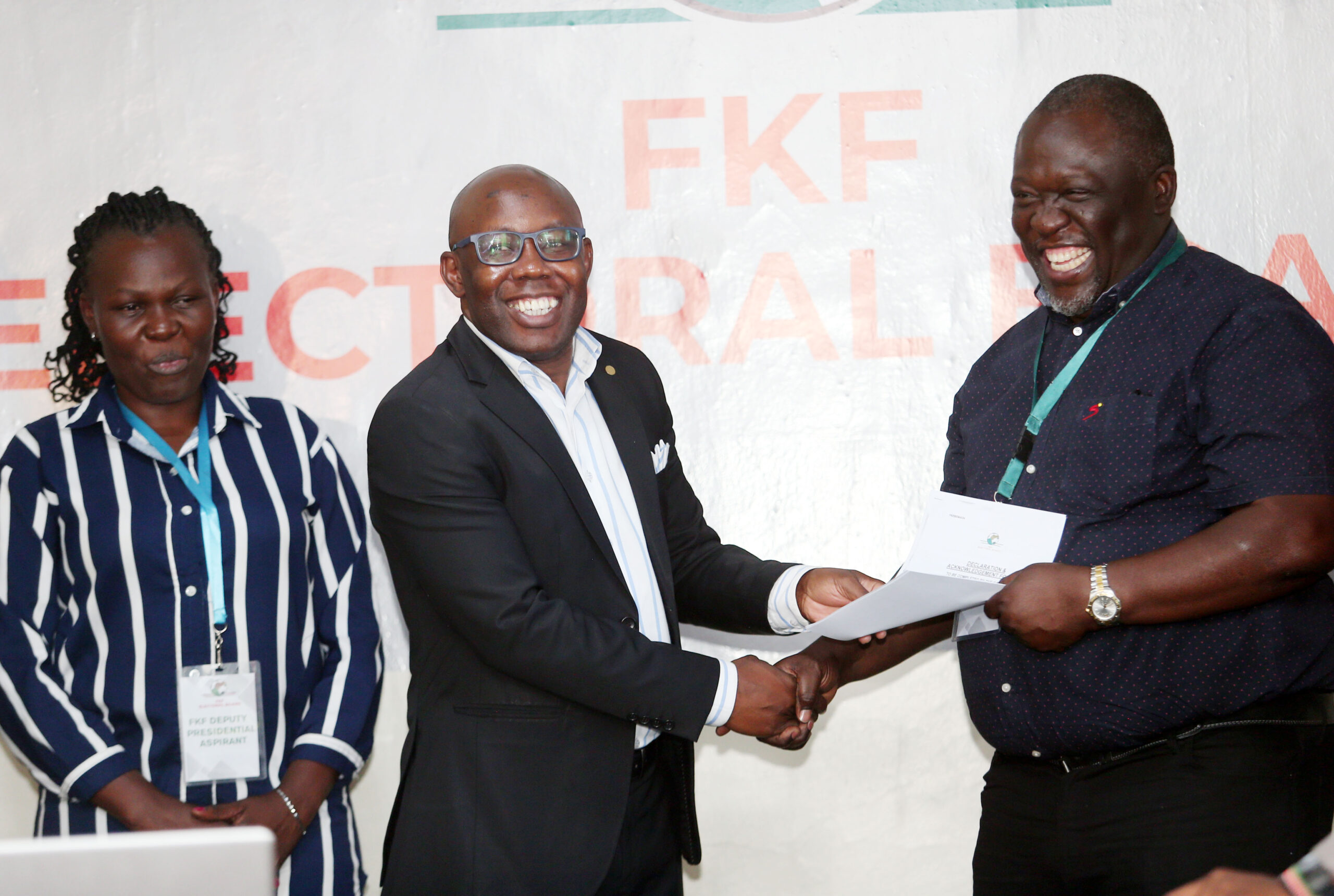 FKF-Election-Board-chairman-Hesbon-Owilla-present-Tom-Alila-form