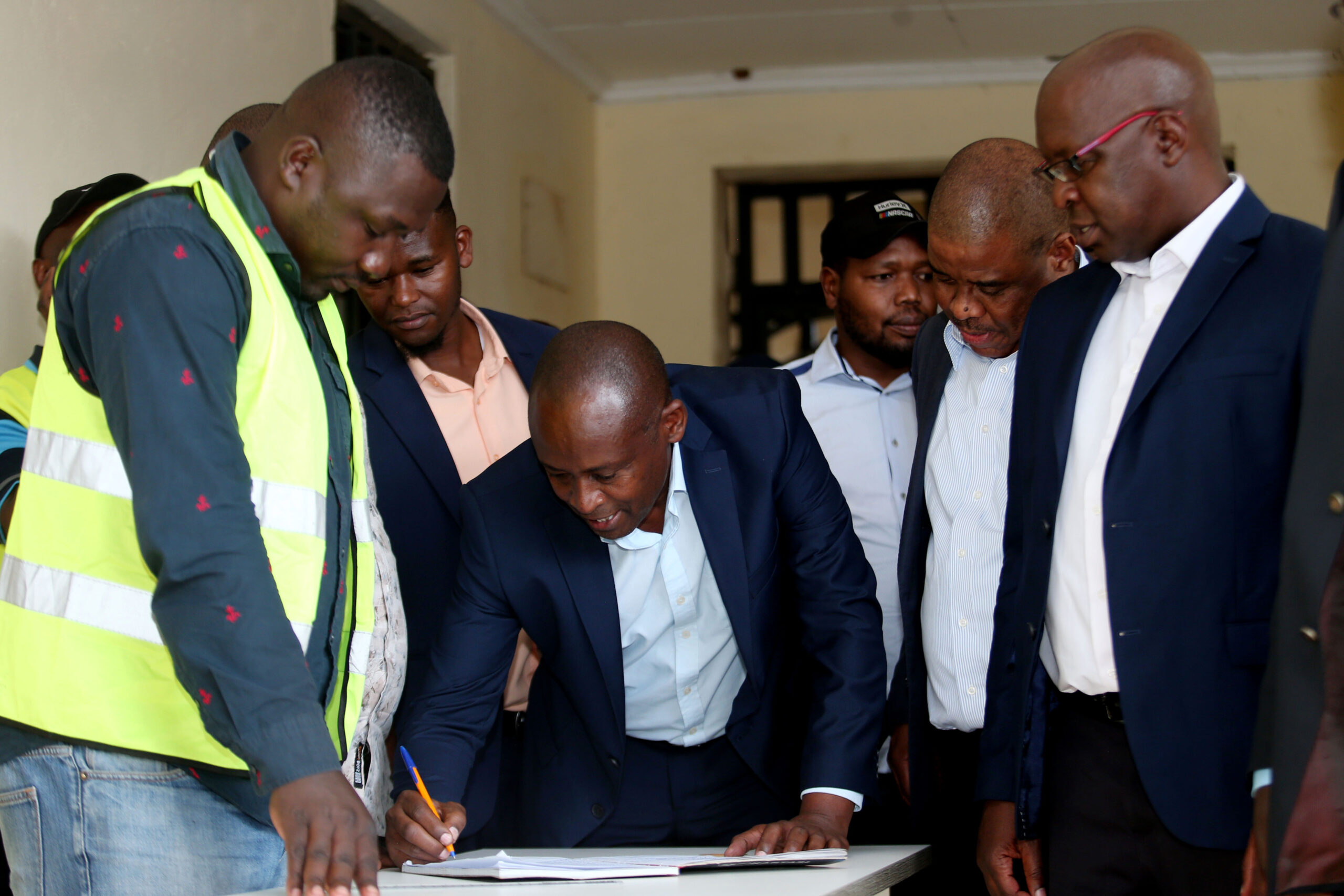 FKF Presidential Candidate Chris Amimo watch his Runningmate Anthony Mutua Register at FKF Election Board Entry Caps