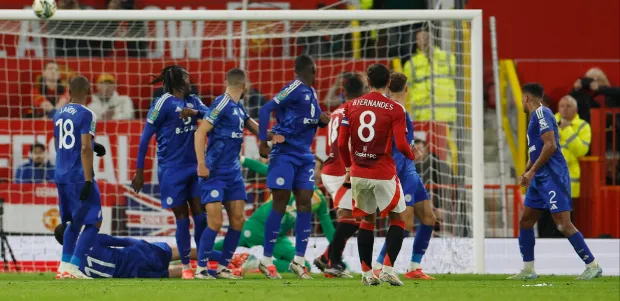 Fernandes' deflected free-kick made it 3-1 moments later Credit: Reuters