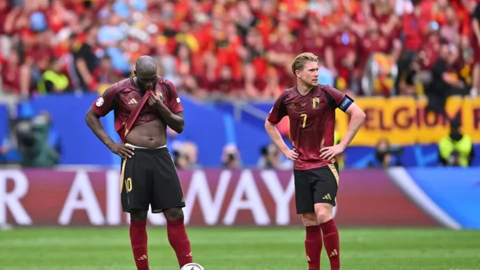 De Bruyne and Romelu Lukaku in action during a Belgium national team training session, focusing on the ball.