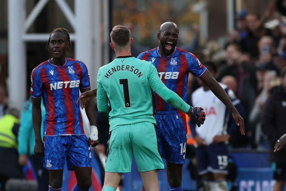 Mateta (right) and Dean Henderson celebrate at full time (Steven Paston/PA)