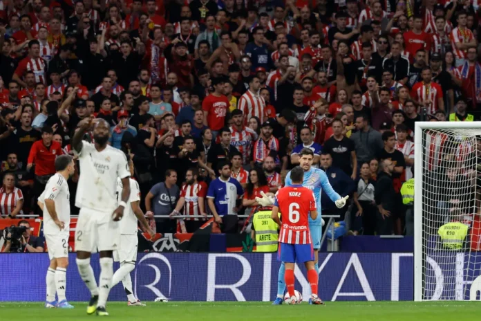 Atlético Madrid fans at Estadio Metropolitano during the derby against Real Madrid, leading to new security measures after objects were thrown onto the pitch