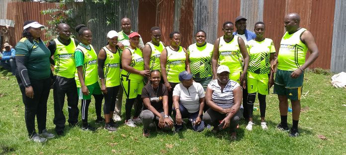 tournament. Teachers proudly pose in their Jambobet-sponsored uniforms during the Kericho Sub-County 1st Edition Teachers Tournament at Kipchimchim Secondary School.