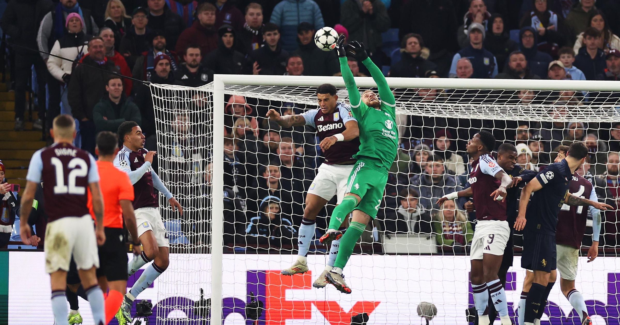 Diego Carlos of Aston Villa fouls Michele Di Gregorio of Juventus, before Morgan Rogers of Aston Villa goes on to score a goal which is later ruled out following a VAR Review, during the UEFA Champions League 2024/25 League Phase MD5 match between Aston VImage credit: Getty Images