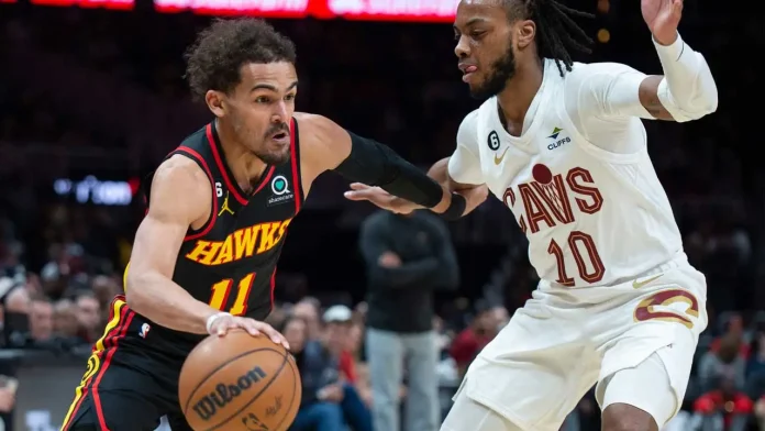 Trae Young had a career-high 22 assists the most in the NBA this season — and scored 20 points as the Atlanta Hawks handed Cleveland just its second loss this season, beating the Cavaliers 135-124 on Thursday night.