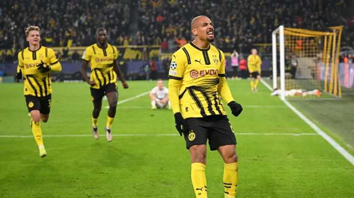 Donyell Malen celebrates after scoring Borussia Dortmund winner over Sturm Graz