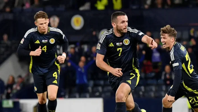 View image in fullscreen John McGinn scores the only goal of the game. Photograph: Andrew Milligan/PA