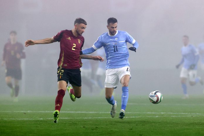 Soccer Football - UEFA Nations League - Group Stage - Israel v Belgium - Bozsik Arena, Budapest, Hungary - November 17, 2024 Belgium's Zeno Debast in action with Israel's Dean David REUTERS/Bernadett Szabo