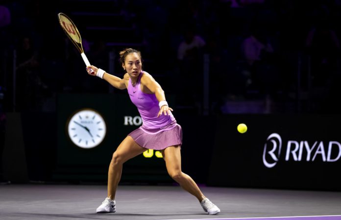 RIYADH, SAUDI ARABIA - NOVEMBER 06: Qinwen Zheng of China in action against Jasmine Paolini of Italy in her third round robin match on Day 5 of WTA Finals Riyadh as part of the Hologic WTA Tour 2024 at King Saud University Indoor Arena on November 06, 2024 in Riyadh, Saudi Arabia (Photo by Robert Prange/Getty Images)