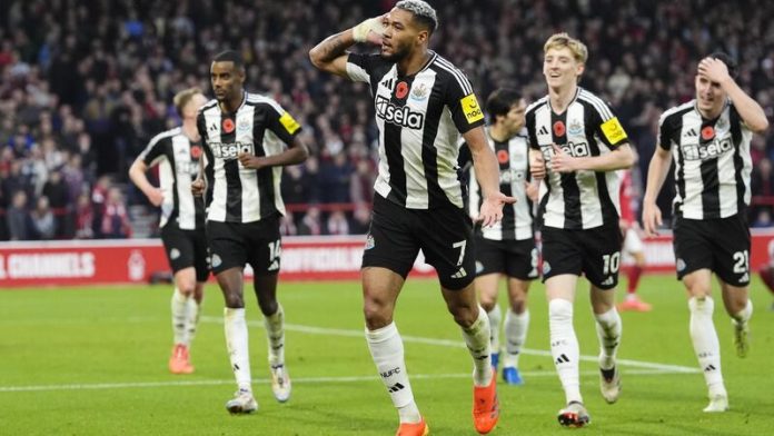 Newcastle United's Joelinton celebrates scoring their side's second goal of the game during the Premier League match at the City Ground, Nottingham. Picture date: Sunday November 10, 2024.