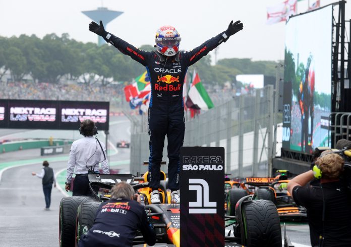 Formula One F1 - Sao Paulo Grand Prix - Autodromo Jose Carlos Pace, Sao Paulo, Brazil - November 3, 2024 Red Bull's Max Verstappen celebrates winning the Sao Paulo Grand Prix REUTERS/Carla Carniel