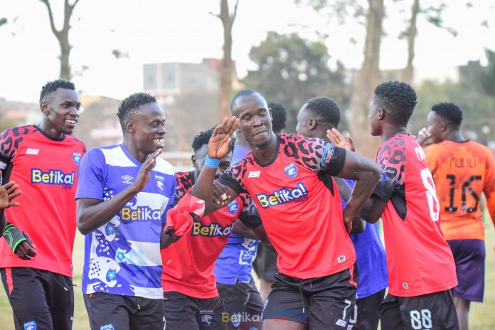 Sydney Lokale celebrates with fellow Leopards teammates after scoring a stoppage time goal against Mara Sugar