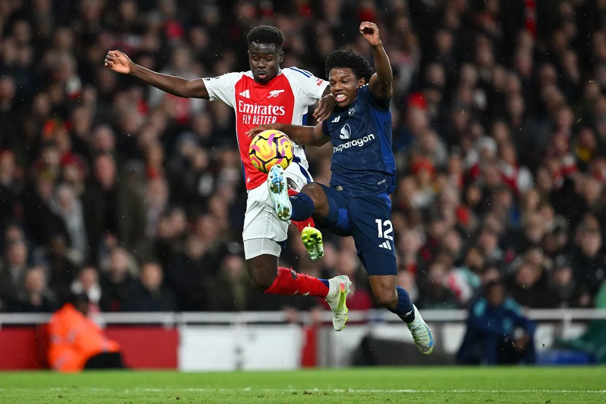 Bukayo Saka battles with Tyrell Malacia ( Image: Getty Images)