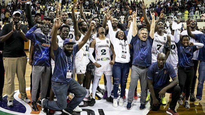 Nairobi City Thunder players and officials celebrate their semi-final win over City Oilers of Uganda during the Africa Champions Clubs Road to Basketball Africa League 2025 Elite 16 East Africa Division qualifiers at the Moi International Sports Centre, Gymnasium on December 2, 2024.