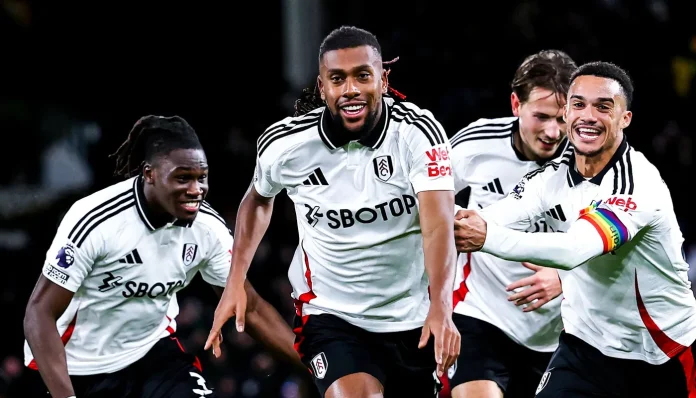 Alex Iwobi celebrates scoring his second goal to confirm Fulham's win against Brighton.