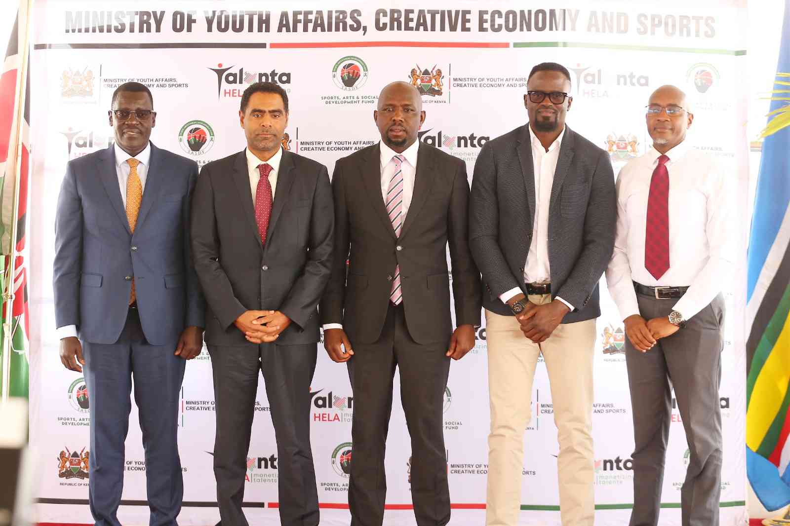 Sports CS Kipchumba Murkomen (centre) flanked by FKF President Hussein Mohamed address after unveiling the CHAN 2024 and AFCON 2027 Local Organising Committee LOC at Talanta Plaza on December 10, 2024. [Stafford Ondego, Standard]