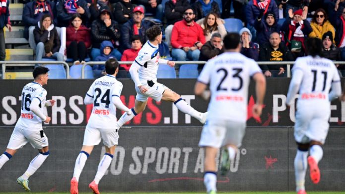 Atalanta's Nicolo Zaniolo celebrates with teammates after scoring their all-important goal. PHOTO: REUTERS