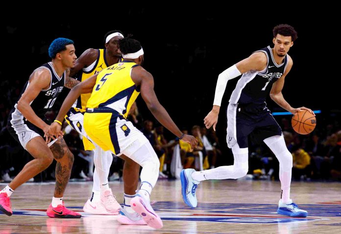 Victor Wembanyama in action during the Spurs game against the Indiana Pacers in Accor Arena, Paris, France. REUTERS/Stephanie Lecocq