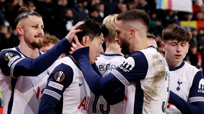 Tottenham skipper Son celebrates with teammates after bagging a brace in against Hoffeinhem- (Getty Images)