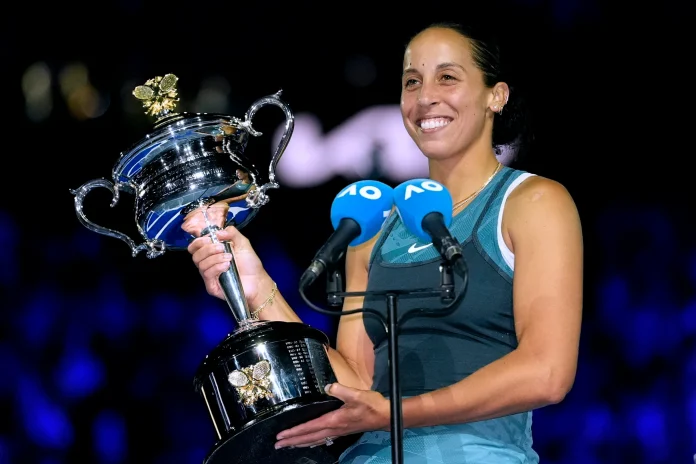 Madison Keys of the U.S. holds the Daphne Akhurst Memorial Cup after defeating Aryna Sabalenka of Belarus in the women's singles final at the Australian Open tennis championship in Melbourne, Australia, Saturday, Jan. 25, 2025. (AP Photo/Asanka Brendon Ratnayake)