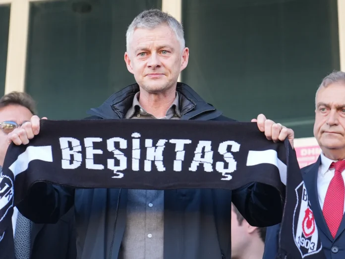 Ole Gunnar Solskjær poses for a photo as he arrives in Istanbul on Friday. Photograph: Anadolu/Getty Images