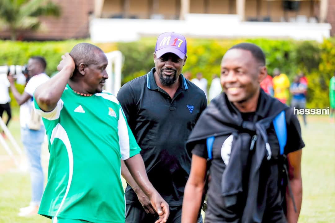 McDonald Mariga share a moment with fans during the Ezekiel Otuoma Memorial 7-a-Side Tournament at ABSA Grounds, celebrating the late football legend's legacy."