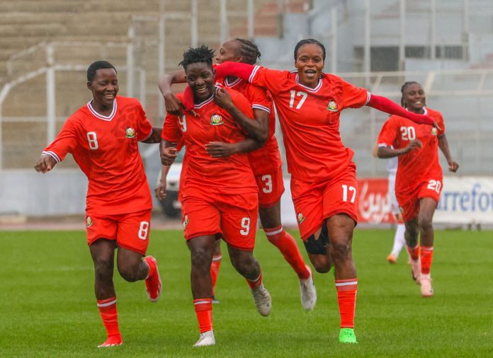 Harambee Starlets celebrate after securing an important 1-0 win in Tunis (C) FKF Media