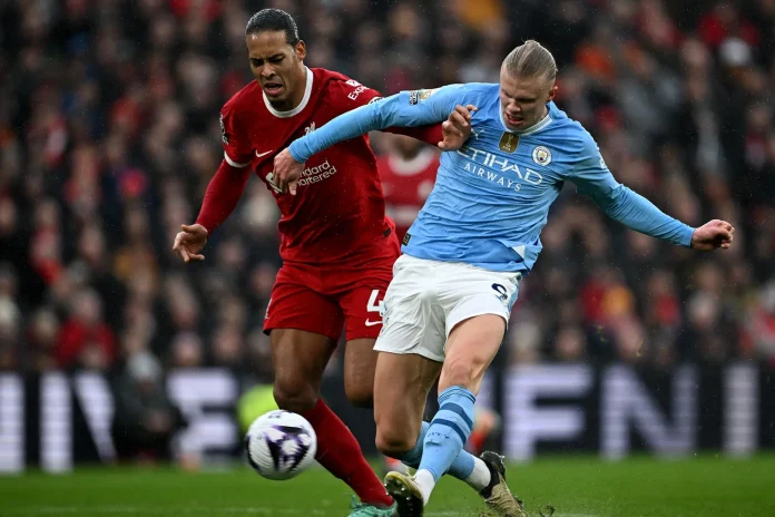 Liverpool defender Virgil Van Djik battles City's pointman Haaland in a past premier League Clash at Anfield:Photo by PAUL ELLIS/AFP via Getty Images