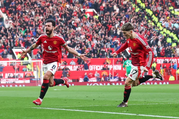 Bruno Fernandez celebrates after netting from a free kick to put Manchester United ahaed in the first half;Photo by Robbie Jay Barratt - AMA/Getty Images