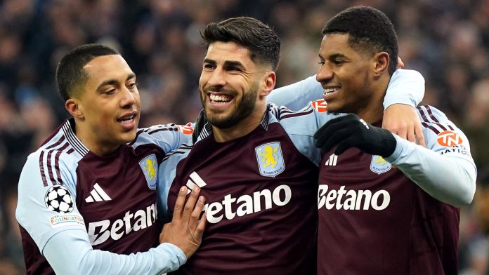 Marco Asensio celebrates with Youri Tielemens and Marcus Rashford after scoring against Club Brugge:Photo Courtesy-Getty Images