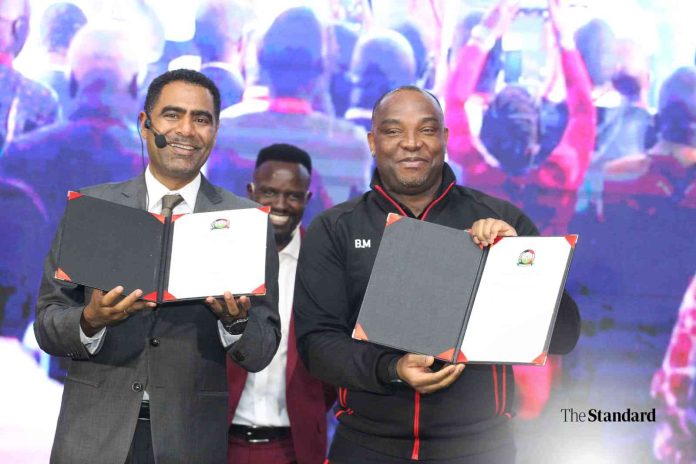 New Harambee Stars head coach Benni McCarthy with FKF boss Hussein Mohammed during the unveiling on March 3, 2025. Photo/RAYMOND MAKHAYA