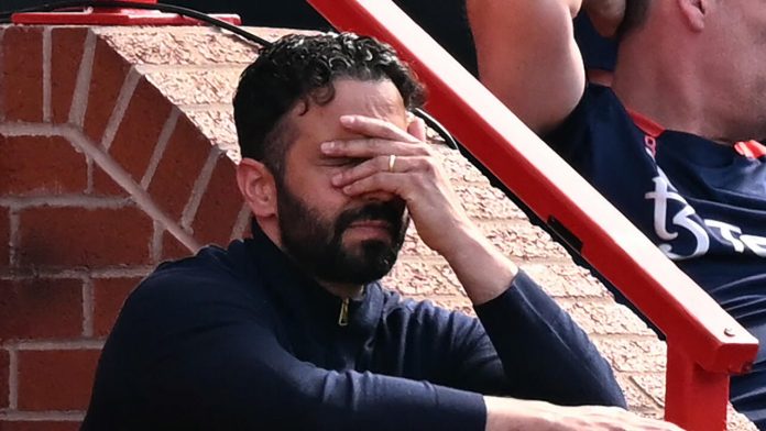 Can't watch: Manchester United boss Ruben Amorim reacts during his side's 2-0 Premier League defeat by West Ham at Old Trafford © Oli SCARFF / AFP