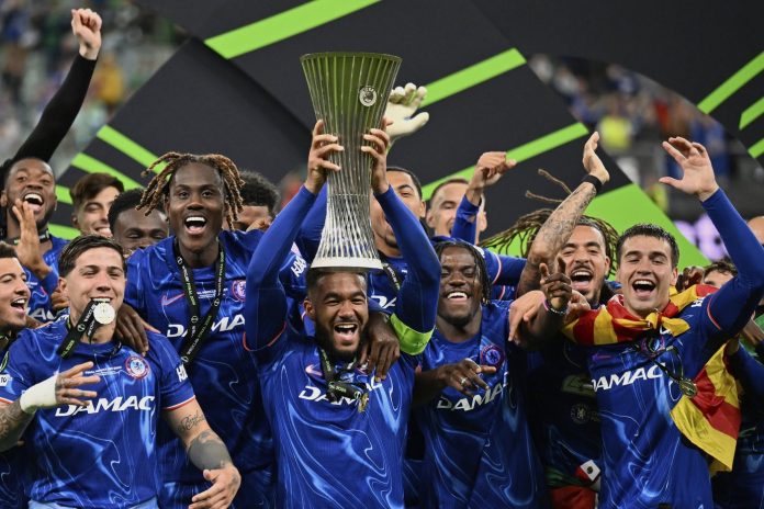 Chelsea's Reece James lifts the trophy after the Europa Conference League final soccer match between Real Betis and Chelsea in Wroclaw, Poland, Wednesday, May 28, 2025. (AP Photo/Denes Erdos)