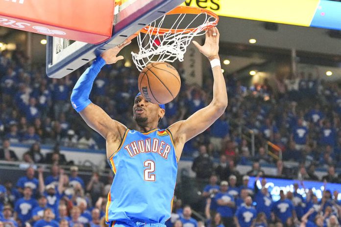 Oklahoma City Thunder’s Shai Gilgeous-Alexander dunks against the Denver Nuggets in Game 7 of their Western Conference semi-final series in Oklahoma City on Sunday.