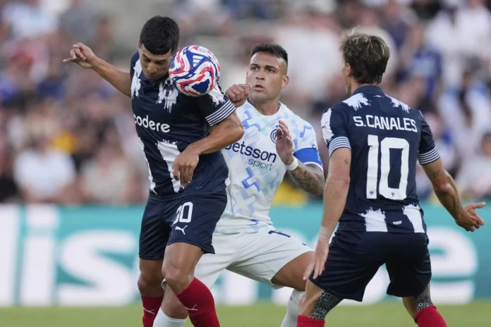 Monterrey's Jorge Rodriguez, left, heads the ball against Inter Milan's Lautaro Martinez, center, during the Club World Cup group E soccer match between CF Monterrey and Inter Milan in Pasadena, Calif., Tuesday, June 17, 2025. Mark J. Terrill - AP