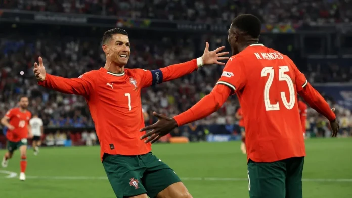Cristiano Ronaldo celebrates after scoring his 137th international goal to give Portugal the lead :Getty Images