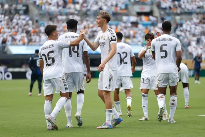 Arda Gueler #15 of Real Madrid C.F. celebrates scoring his team's second goal with teammates:Photo by Antonio Villalba/Real Madrid via Getty Images