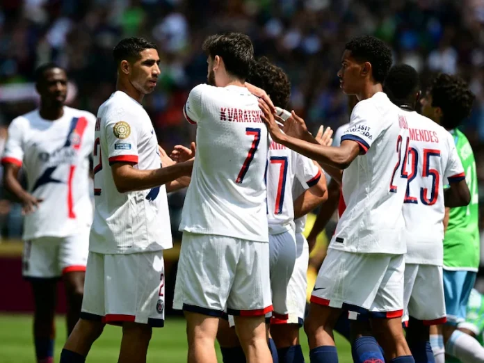 Khvicha Kvaratskhelia and Achraf Hakimi scored either side of half-time as European champions PSG eased to a 2-0 win over Seattle Sounders on Monday to secure their place in the last 16 of the Club World Cup