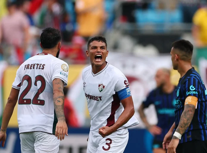Thiago Silva and Juan Freytes celebrate after Hercules scores Fluminense's second football goal [Agustin Marcarian/Reuters]